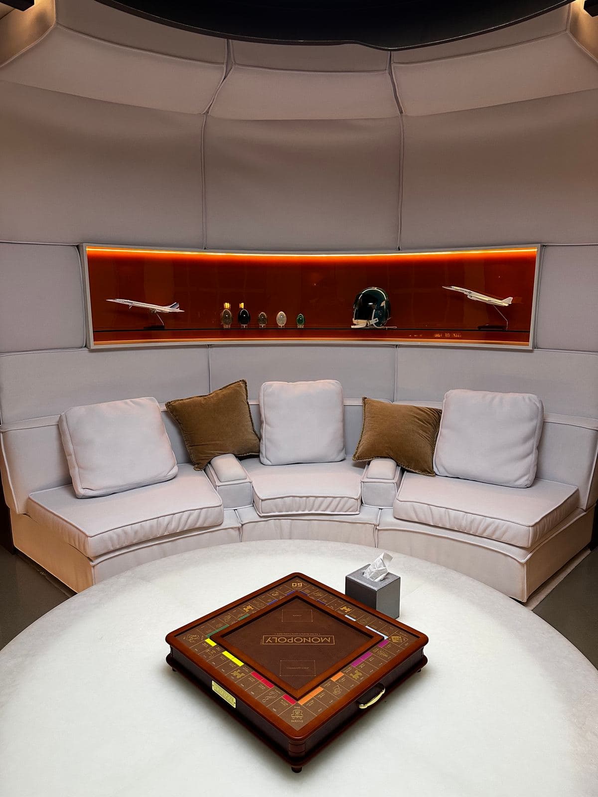 Richard Mille boutique lounge with backlit display case, spotless at turnover